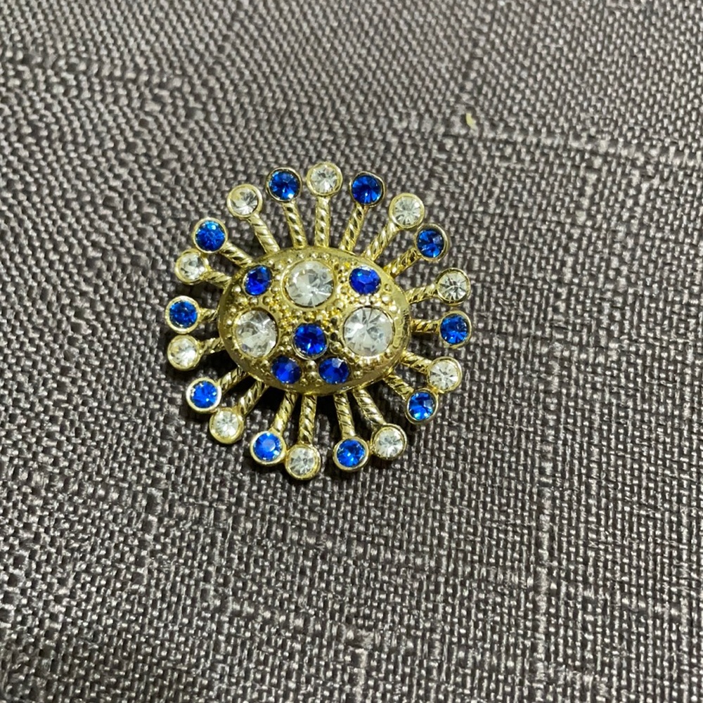Rare blue and gold brooch